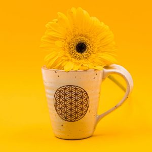 Kaffeetasse mit Blume des Lebens